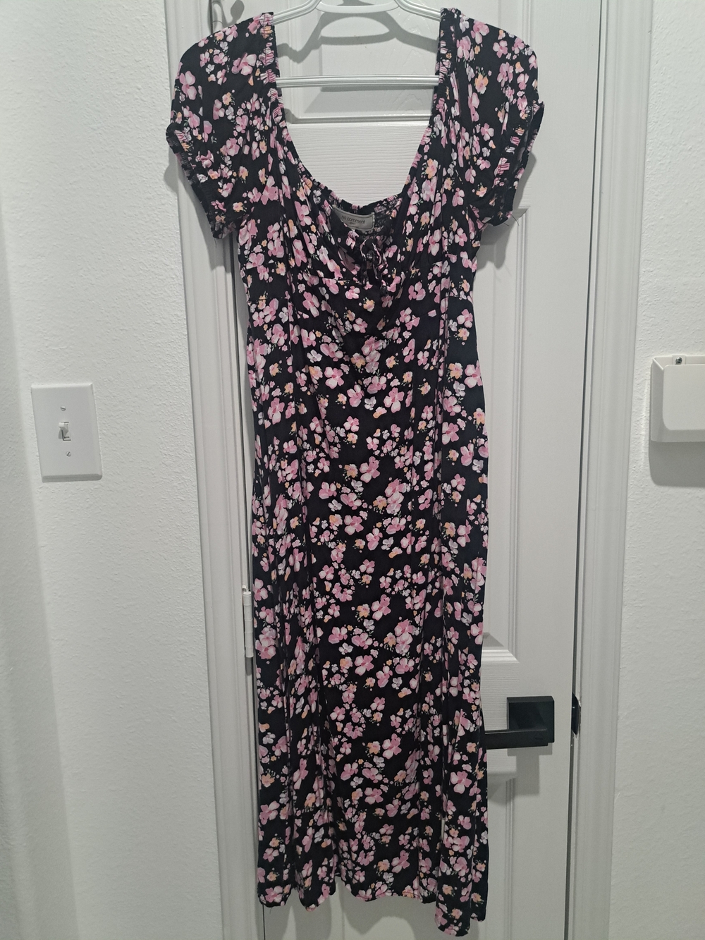 Feminine Black Maxi Dress with Pink Floral Print